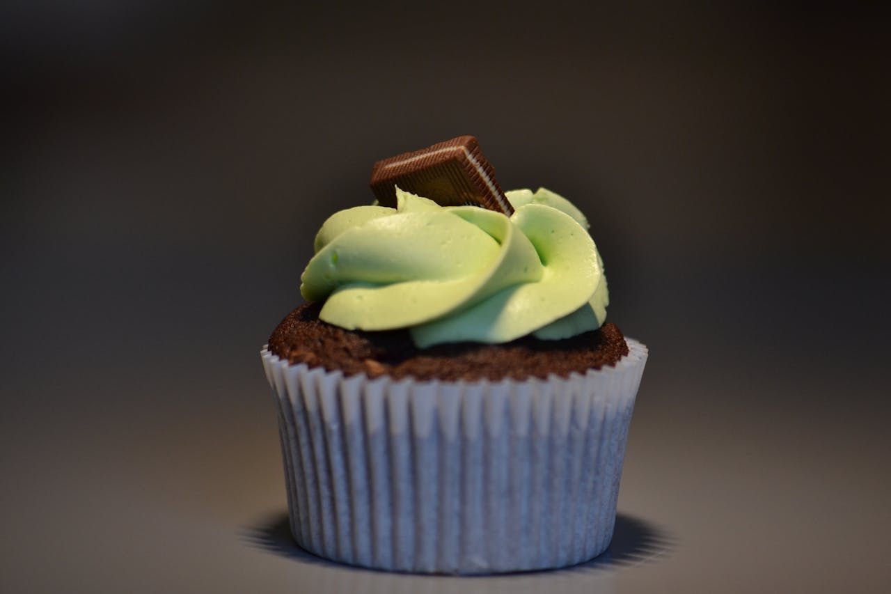 Selective Focus Photography Of Chocolate Cupcake